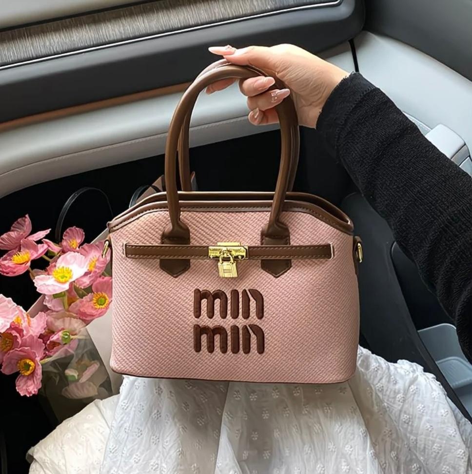 Elegant Dusty Pink Textured Structured Handbag for Women with Brown Top Handles, Gold-Tone Lock Detail & Spacious Everyday Tote Design