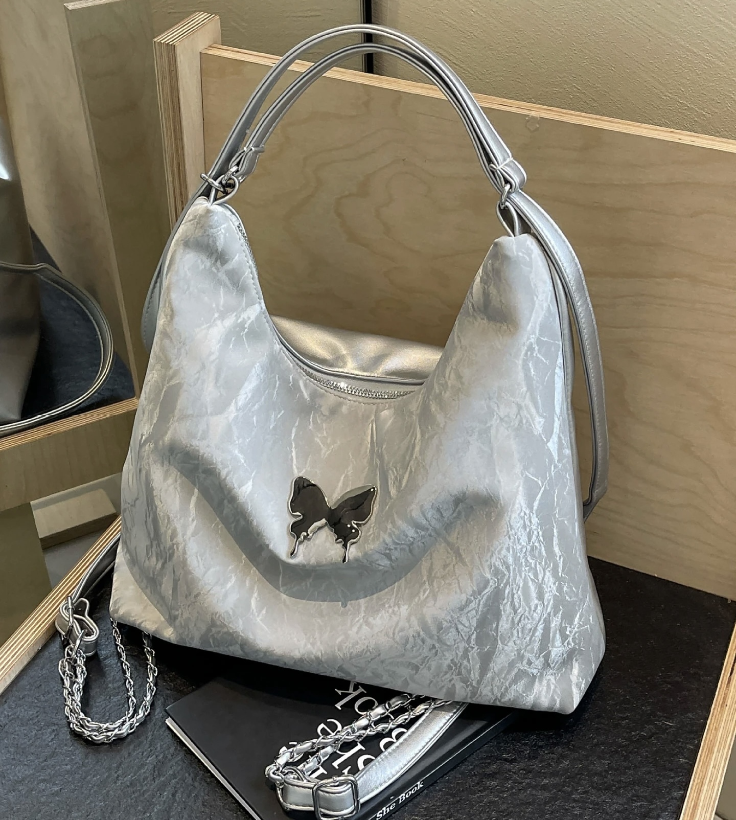 Trendy Silver Metallic Shoulder Bag for Women | Stylish Crinkled Hobo Tote Bag with Metal Butterfly Accent & Chain Strap